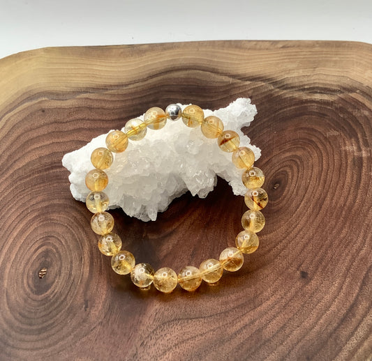 Citrine stretch bracelet with sterling silver bead.