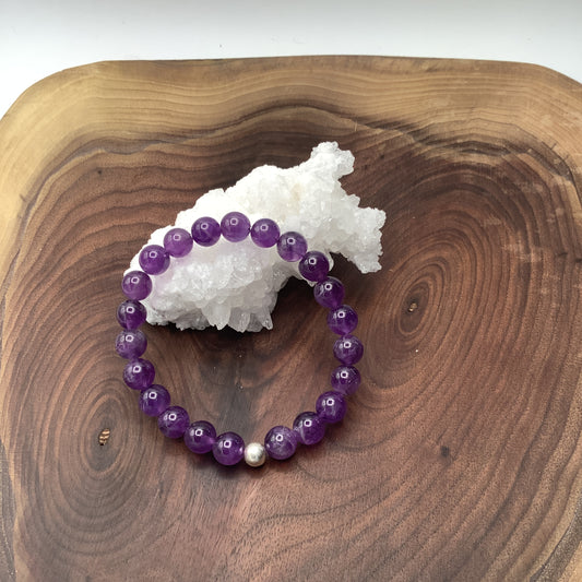 amethyst  stretch bracelet with sterling silver bead 